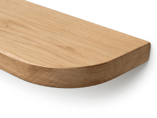 Solid oak curved-edge wall shelf with a softened radiused front, handmade in the UK