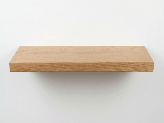 Oak wall shelf with a clean straight edge showing natural grain by Farm Furniture
